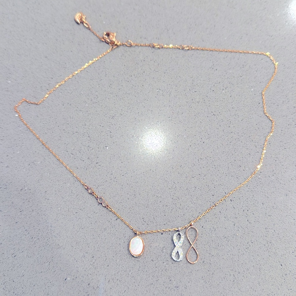 Swarovski infinity rose gold necklace with opal